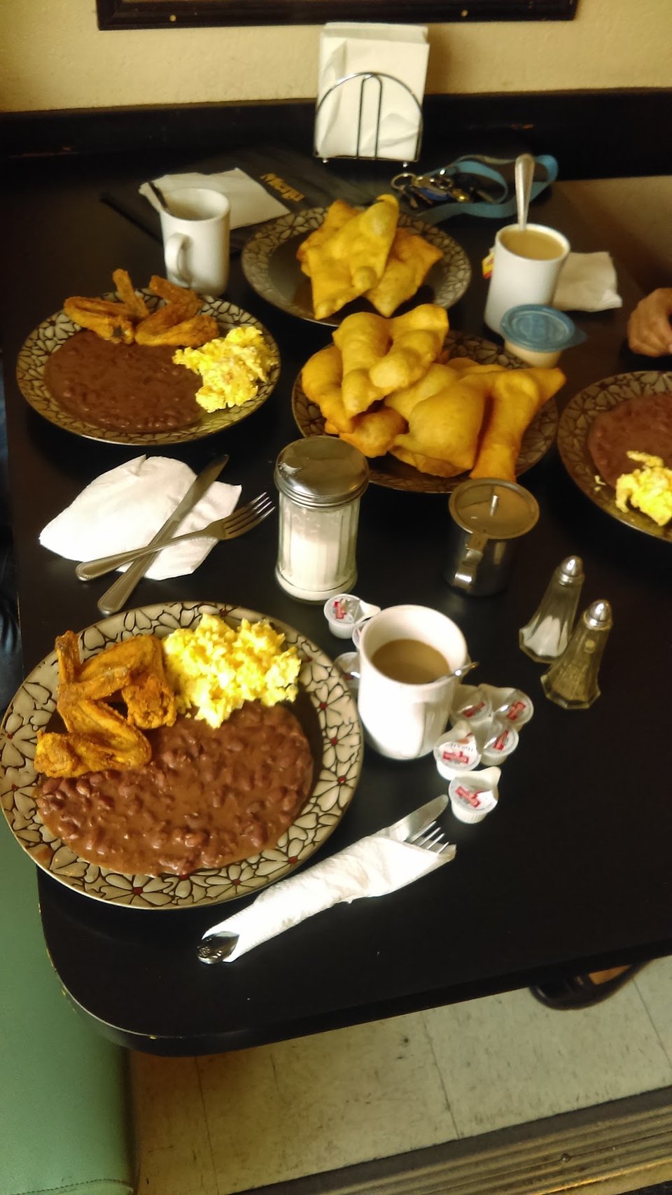 Breakfast section beside dinner plates and desserts.