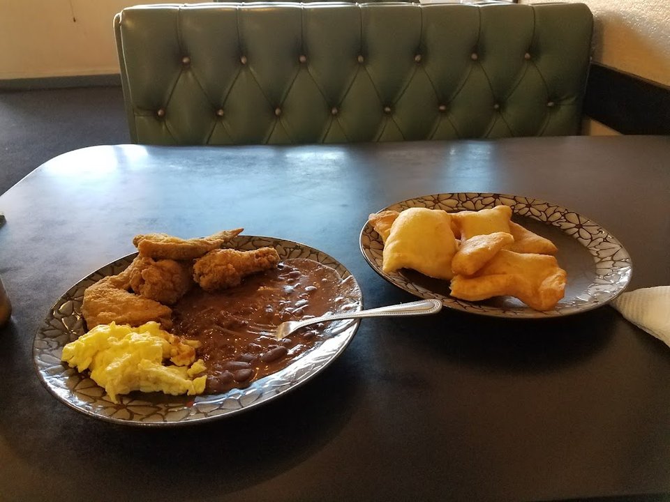 Menu page showing breakfast, appetizers, and dinner entrées.